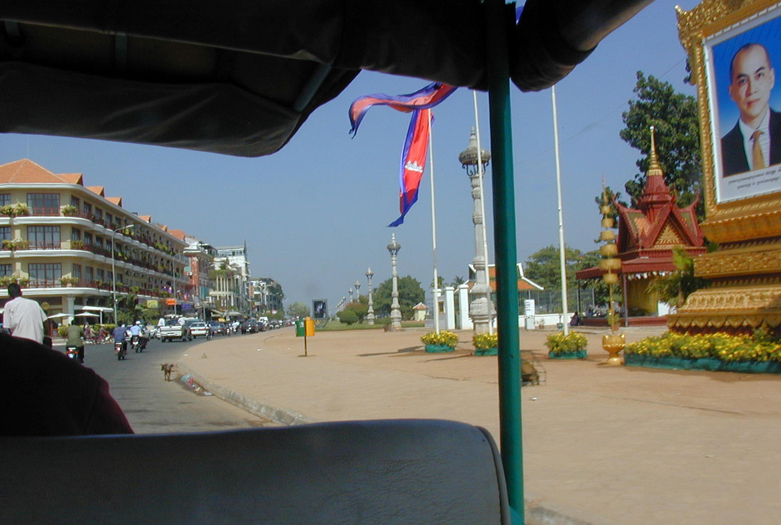 Sisowath Quay, and the ubiquitous royal portrait