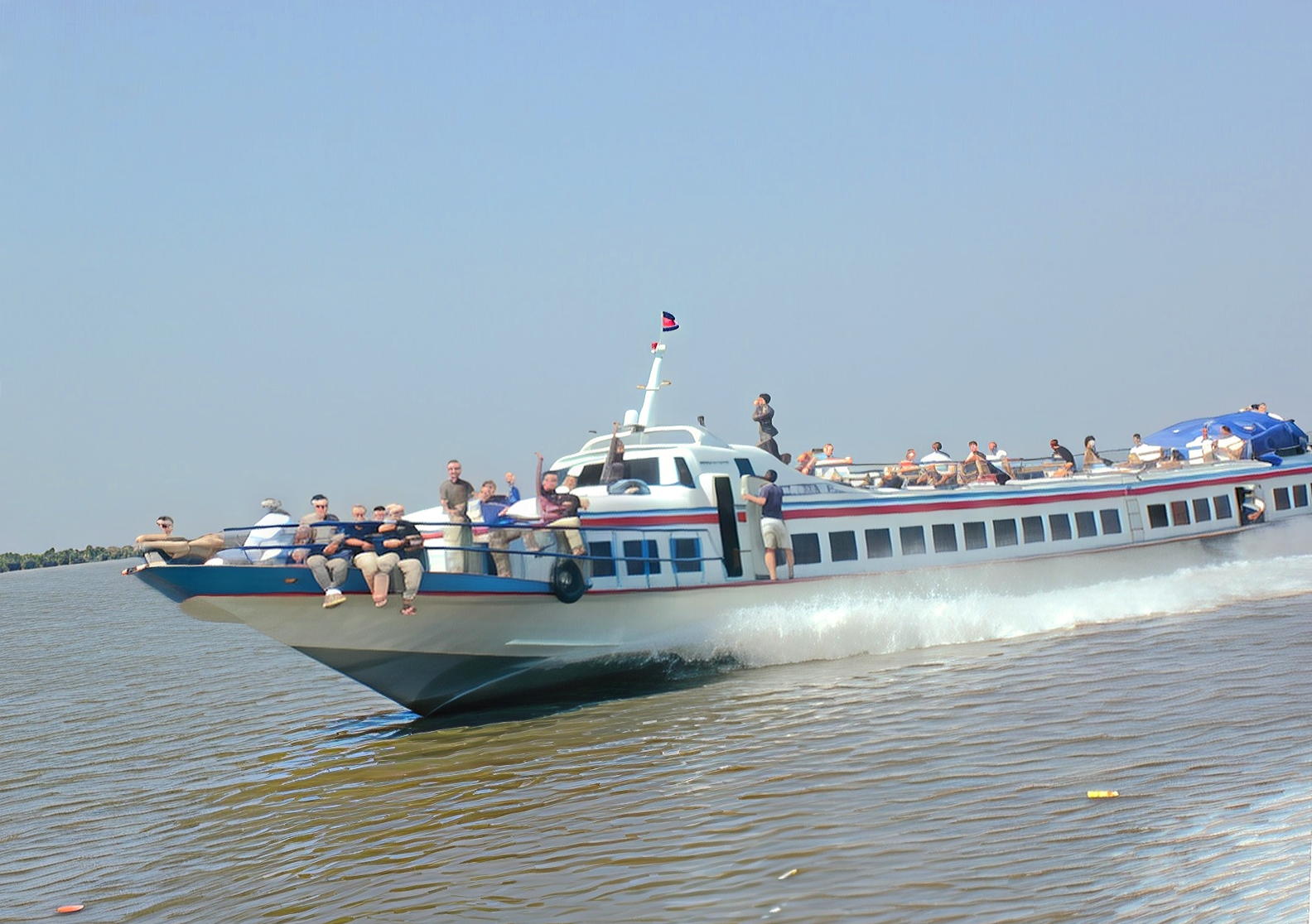 Passing the downriver boat from Siem Reap
