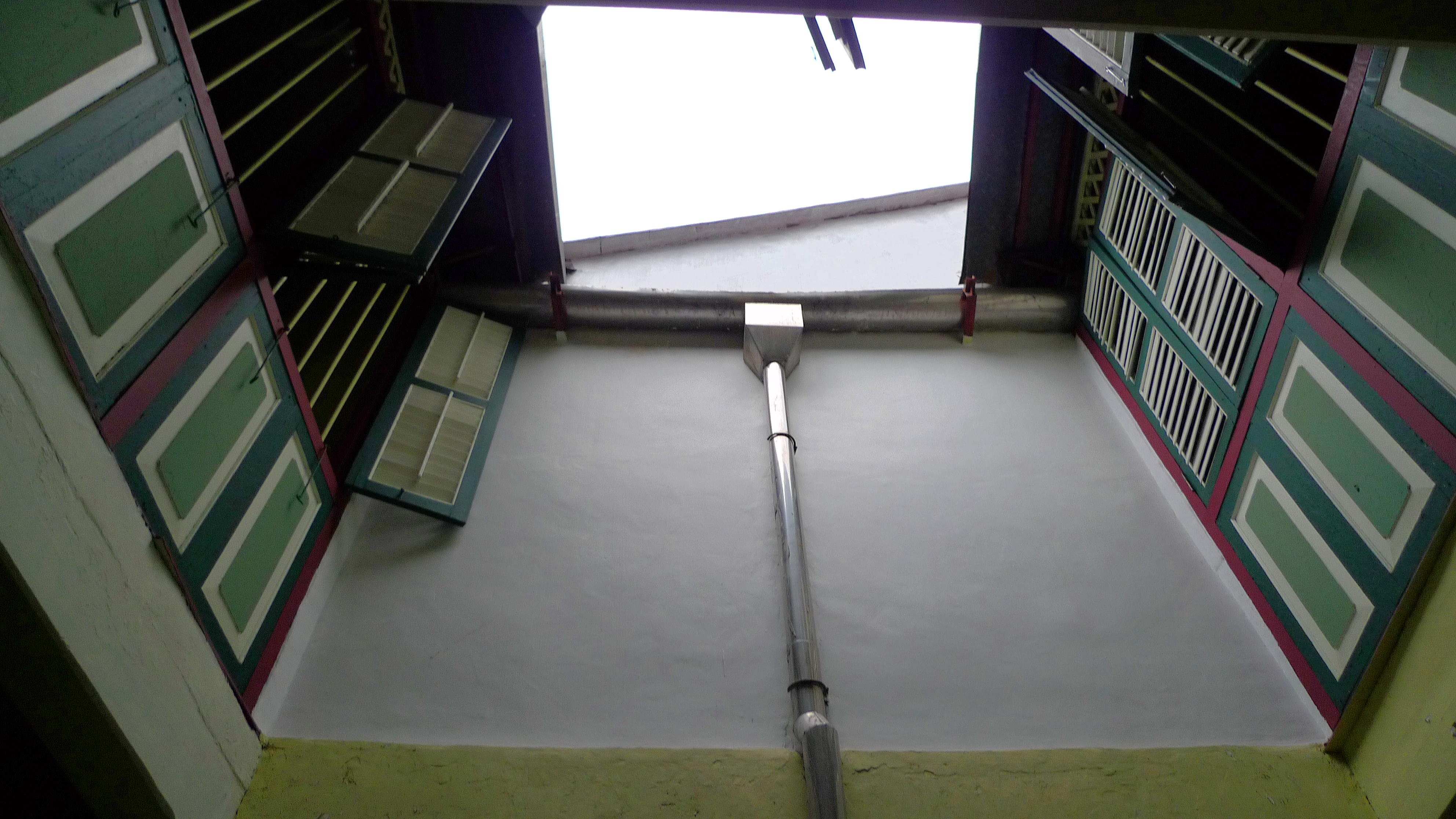 Inside a converted shophouse, with interior open to the sky